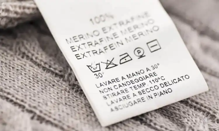 how to put a tag back on clothes
