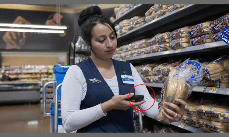 walmart employees are using rfid scanners to scan product labels